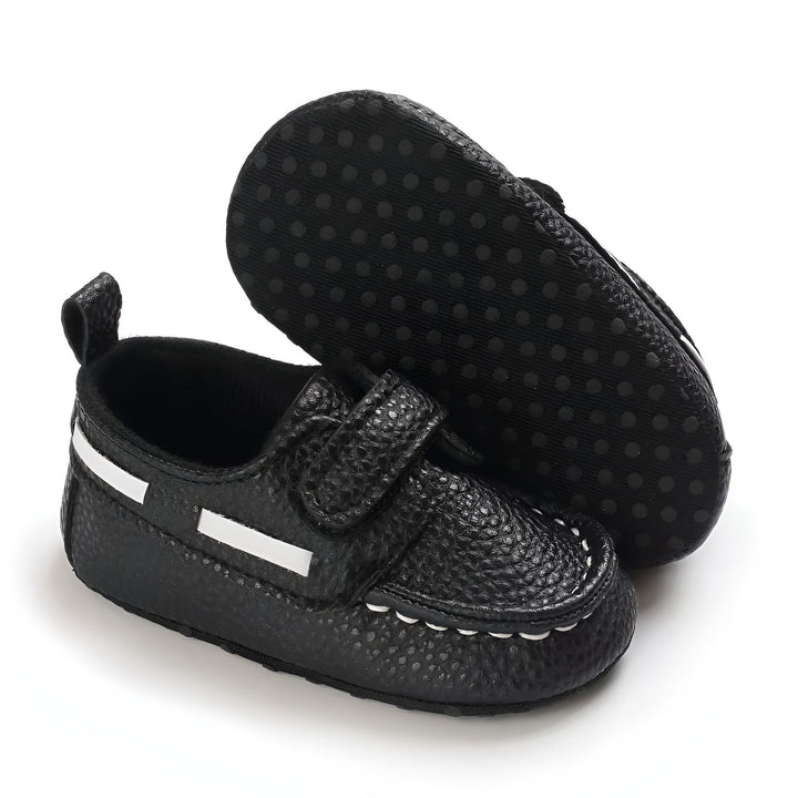 Chaussures de bébé noires avec des rayures blanches, offrant un style élégant et confortable pour les petits pieds. Semelle antidérapante pour une meilleure adhérence., 45286826180789,45286826213557,45286826246325,45286826279093,45286826311861,45286826344629,45286826377397,45286826410165,45286826442933
