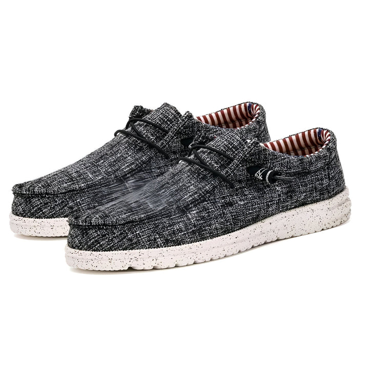 Paire de chaussures décontractées pour hommes, style mocassin, en tissu texturé gris et noir, avec lacets noirs et semelle blanche mouchetée. Doublure intérieure rayée., 45286731415733,45286731448501,45286731481269,45286731514037,45286731546805,45286731579573,45286731612341,45286731645109,45286731677877,45286731710645,45286731743413,45286731776181,45286731808949,45286731841717,45286731874485,45286731907253,45286731940021,45286731972789,45286732005557,45286732038325,45286732071093,45286732103861