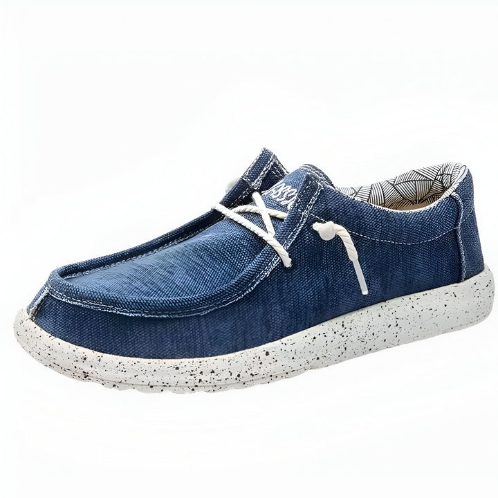 Chaussure décontractée en toile denim bleue pour femme. Style mocassin avec lacets élastiques blancs. Semelle blanche mouchetée. Confort et style décontracté., 45286669549749,45286669582517,45286669615285,45286669648053,45286669680821,45286669713589,45286669746357,45286669779125,45286669811893,45286669844661,45286669877429,45286669910197,45286669942965,45286669975733,45286670008501,45286670041269,45286670074037,45286670106805,45286670139573,45286670172341,45286670205109,45286670237877,45286670270645