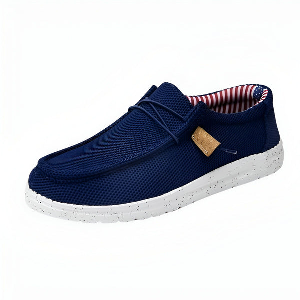 Mocassin bleu marine avec semelle blanche tachetée et doublure rayée rouge et blanche. Détail d'étiquette en liège sur le côté., 45286678397109,45286678429877,45286678462645,45286678495413,45286678528181,45286678560949,45286678593717,45286678626485,45286678659253,45286678692021,45286678724789,45286678757557,45286678790325,45286678823093,45286678855861,45286678888629,45286678921397,45286678954165,45286678986933,45286679019701,45286679052469,45286679085237,45286679118005,45286679150773,45286679183541