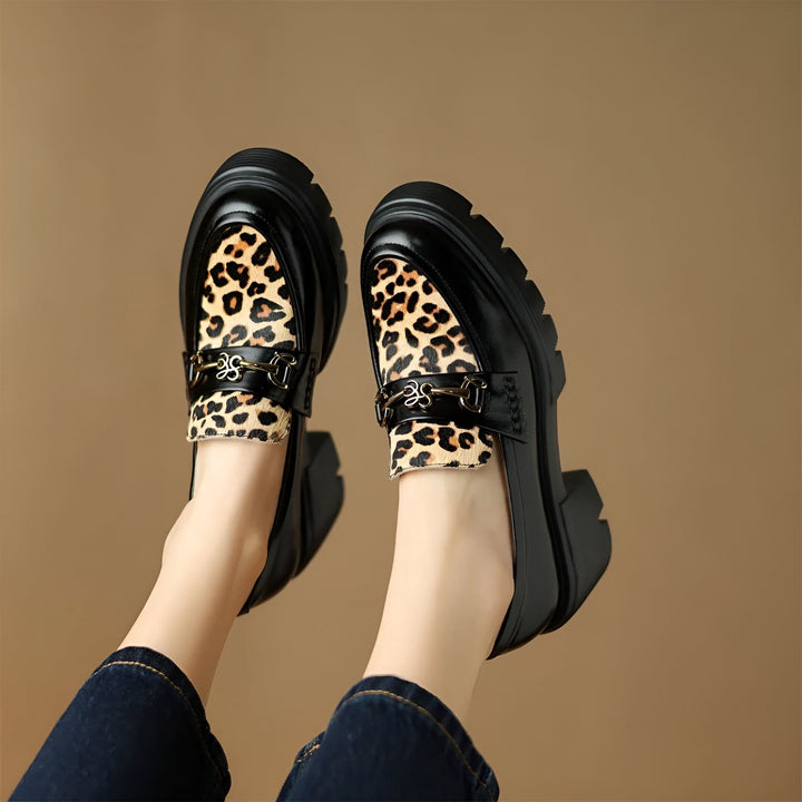 Mocassins noirs à plateforme avec motif léopard et boucle métallique. Chaussures tendance et originales, parfaites pour un look audacieux., 45286649594037,45286649626805,45286649659573,45286649692341,45286649725109
