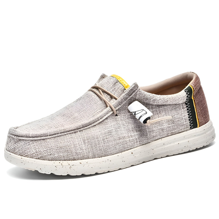Mocassin décontracté beige avec lacets élastiques, semelle mouchetée blanche et détail coloré au talon. Chaussure confortable et tendance pour hommes., 45286690422965,45286690455733,45286690488501,45286690521269,45286690554037,45286690586805,45286690619573,45286690652341,45286690685109,45286690717877,45286690750645,45286690783413,45286690816181,45286690848949,45286690881717,45286690914485,45286690947253,45286690980021,45286691012789,45286691045557,45286691078325,45286691111093,45286691143861,4528669