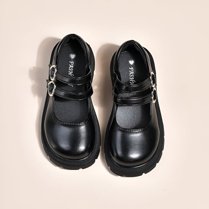 Paire de chaussures Mary Jane noires à semelles épaisses. Fermeture avec deux brides à boucle., 45286684262581,45286684295349,45286684328117,45286684360885,45286684393653,45286684426421,45286684459189,45286684491957,45286684524725,45286684557493