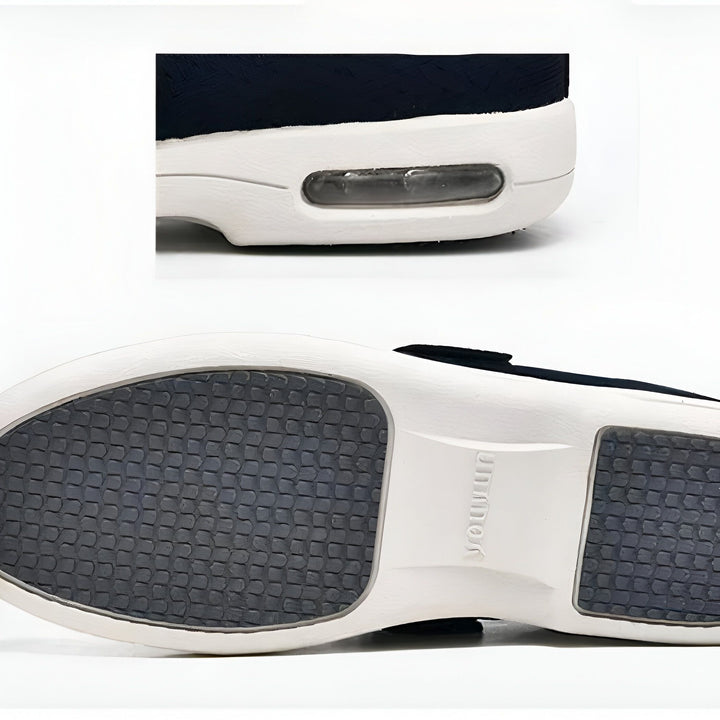 Gros plan sur une chaussure noire et blanche, montrant la semelle antidérapante grise et un coussin d'air transparent dans la semelle intermédiaire blanche. Conception moderne et confort., 45286748094645,45286748127413,45286748160181,45286748192949,45286748225717,45286748258485,45286748291253,45286748324021,45286748356789,45286748389557,45286748422325,45286748455093,45286748487861,45286748520629,45286748553397,45286748586165,45286748618933,45286748651701,45286748684469,45286748717237,45286748750005,4528