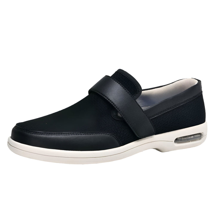 Chaussure médicale noire avec velcro, idéale pour les personnes ayant des problèmes de pieds ou de mobilité. Confort et soutien pour une marche facilitée. Semelle blanche avec coussin d'air visible., 45286748094645,45286748127413,45286748160181,45286748192949,45286748225717,45286748258485,45286748291253,45286748324021,45286748356789,45286748389557,45286748422325,45286748455093,45286748487861,45286748520629,45286748553397,45286748586165,45286748618933,45286748651701,45286748684469,45286748717237,45286